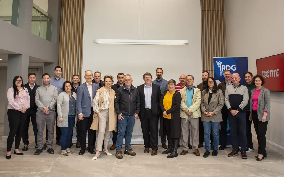 An IRDG member group at Henkel's Irish site, gathered in the reception atrium.